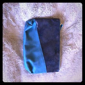 Shimmery canvas travel makeup bag.